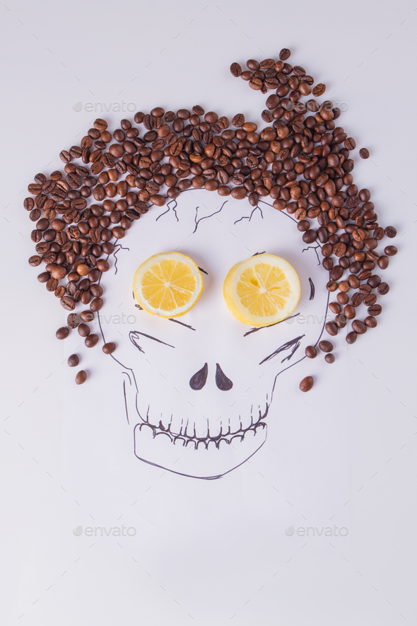 Still life with skull and coffee beans.