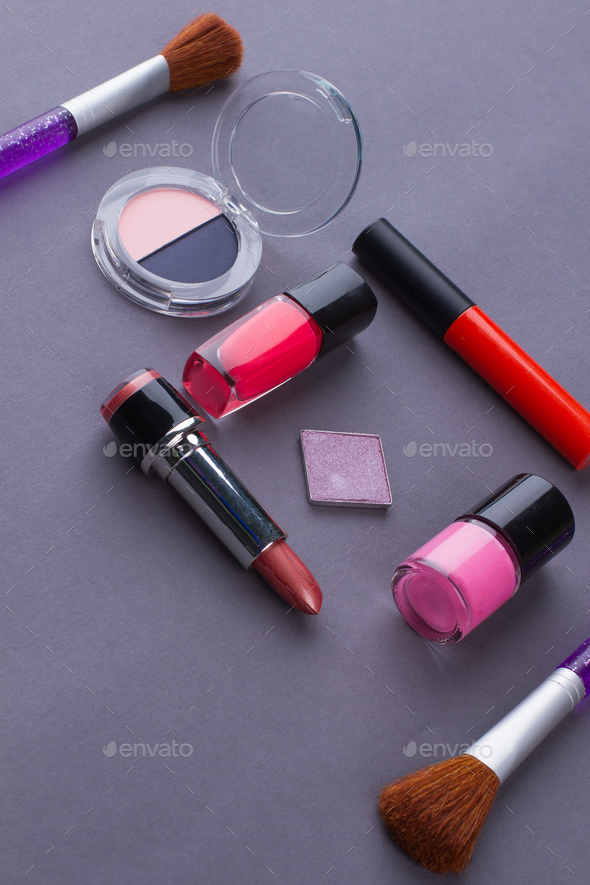 Close up various beauty layout cosmetic items.