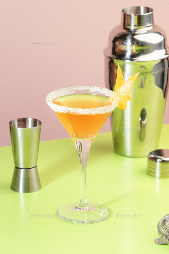 Sidecar alcoholic cocktail with cognac, liqueur, lemon juice and ice