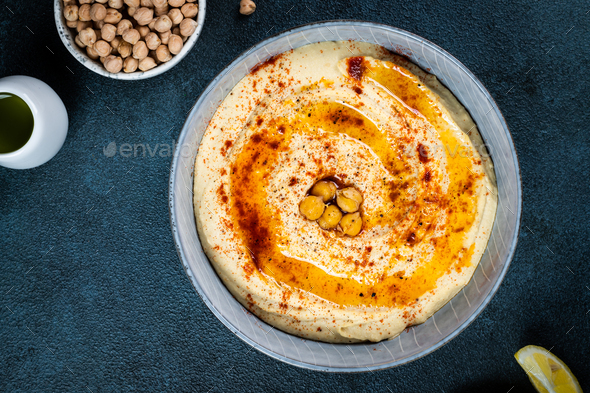 Traditional Middle east appetizer Hummus served with lemon and tahini