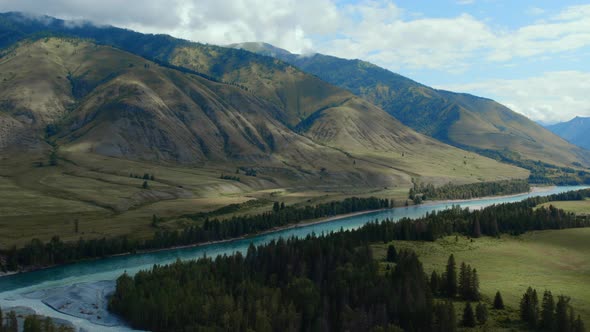Blue Katun river in the middle of mountains of Ak-Kem valley in Altai