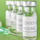Covid-19 vaccine vials. Coronavirus pandemic infection. Global prevention vaccination - PhotoDune Item for Sale