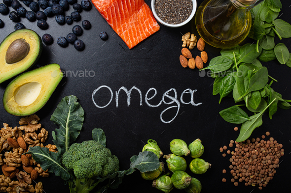 Healthy food background with good fat sources, ingredients rich in Omega−3 fatty acids