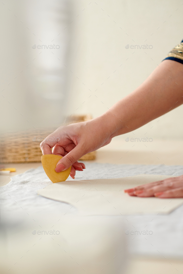 Seamstress Marking out Pattern with Chalk Stock Photo by DragonImages
