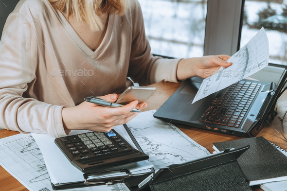 Investments. Young woman investor buys stocks on the stock exchange stock market - Stock Photo - Images