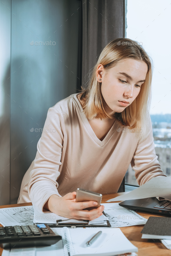 Investments. Young woman investor buys stocks on the stock exchange stock market - Stock Photo - Images