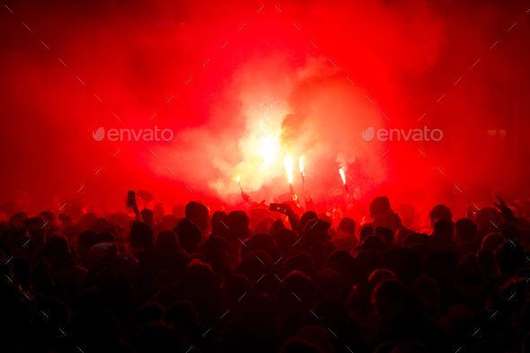 football fans lit up the lights and smoke bombs. revolution. protest - Stock Photo - Images