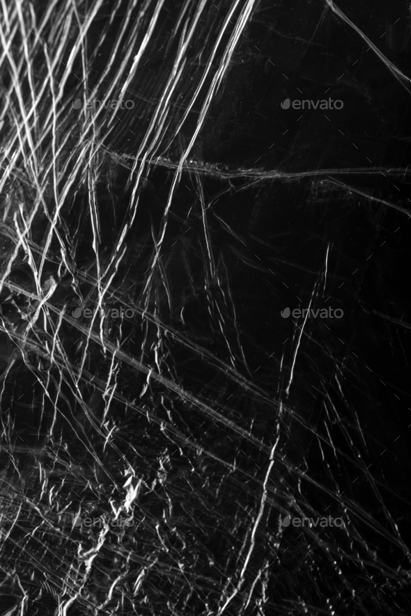 Wrinkled plastic wrap texture on a black background wallpaper Stock ...