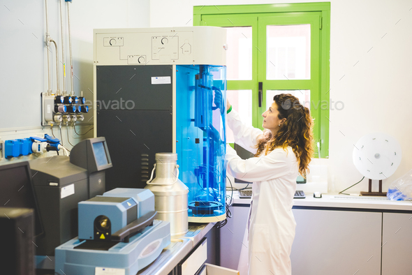 Female scientist measuring the surface area of mesoporous materials with BET instrument