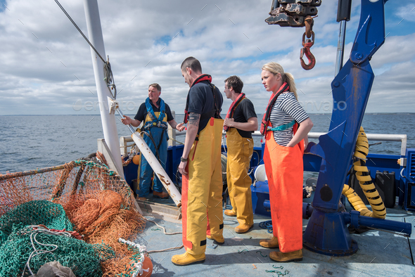 Research scientists on deck of research ship with trawler net Stock ...