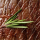 Beef steak with rosemary on whole background, close up - PhotoDune Item for Sale