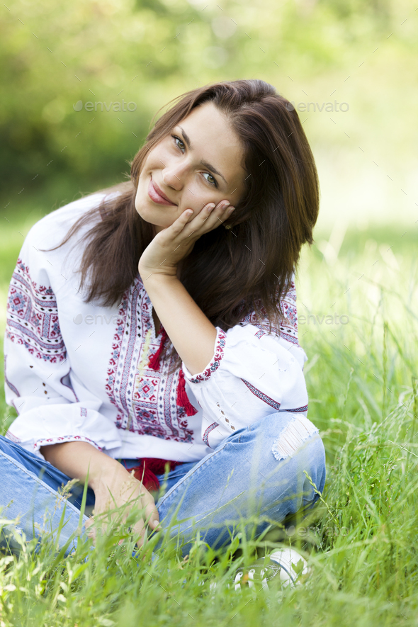 Slav teen girl at green meadow in national ukrainian clothing. Stock ...