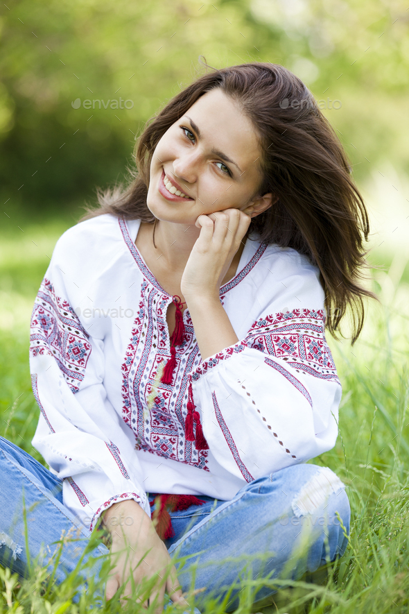 Slav teen girl at green meadow in national ukrainian clothing. Stock ...