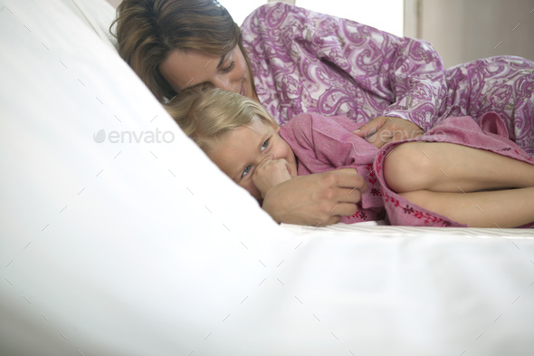 Mother and daughter relaxing in hotel spa