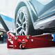 Modern Vehicle and the Floor Jack Lift Vehicle Maintenance - PhotoDune Item for Sale