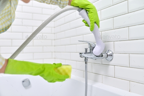 Steam cleaning the bathroom, cleaning without use of chemical detergents, using steamer