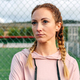 Serious sportswoman with boxer braids posing with crossed arms - PhotoDune Item for Sale