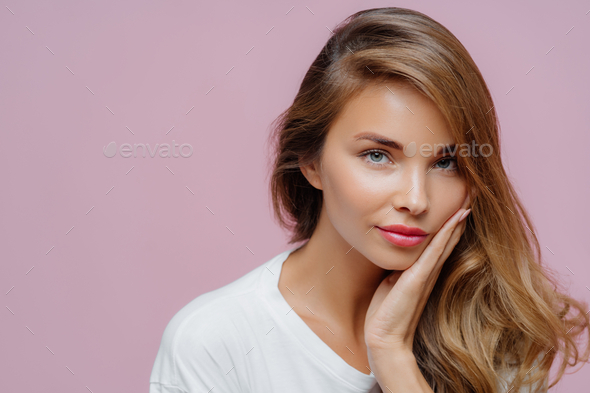 Self Confident Beautiful Woman Has Long Hair Combed On One Side