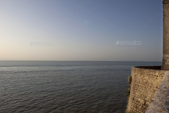Stoned wall and Atlantic Ocean on background - Stock Photo - Images