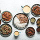 Indian ethnic food buffet on white concrete table from above - PhotoDune Item for Sale
