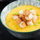 Creamy pumpkin puree soup with croutons, peppers and green onions. - PhotoDune Item for Sale