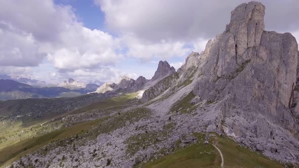 Aerial Flight Above Mountain Top in Sunny Day alt