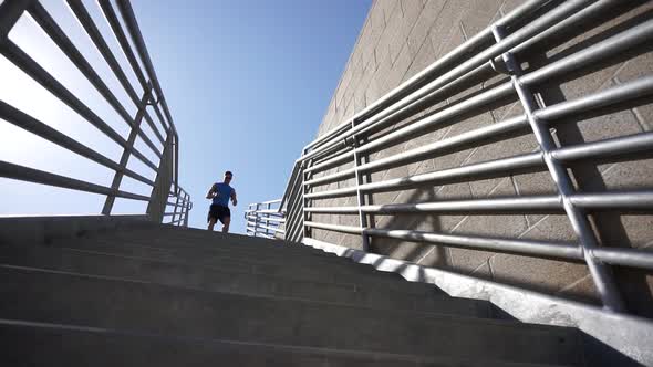 A man running stairs. alt