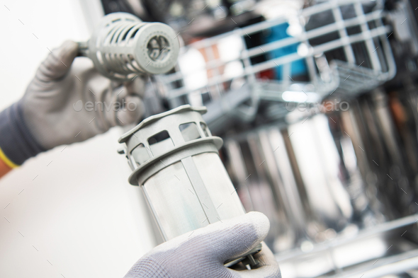 Cleaning Dishwasher Filter Cage - Stock Photo - Images