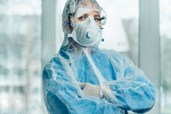 Portrait of woman doctor weaing protective suit during coronavirus pandemic