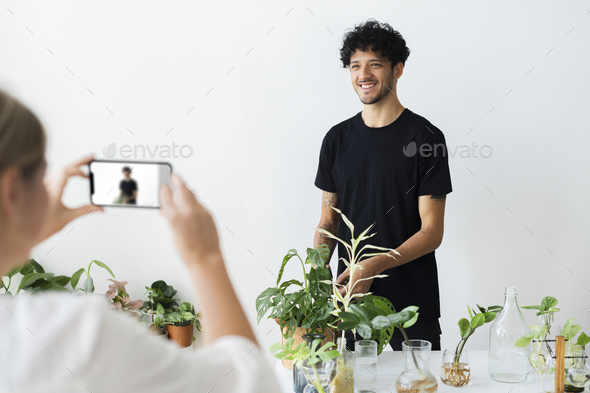 Plant content creator vlogging about horticulture - Stock Photo - Images
