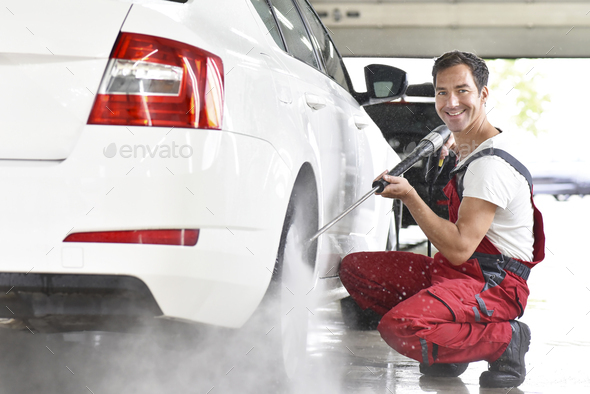 Car cleaning, man cleaning car with high-pressure cleaner