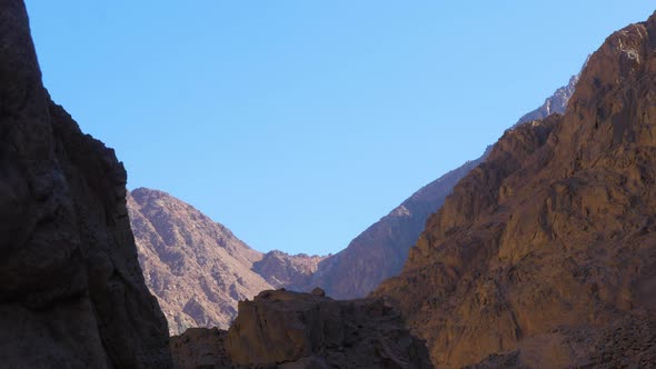 View with rocky mountains at Colored Canyon of Egypt Sinai desert Dahab in sunny day, wide shot with alt