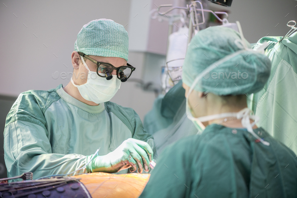 Heart surgeon during a heart operation
