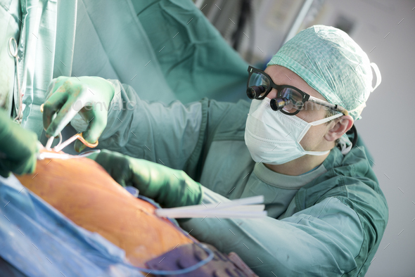 Heart surgeon during a heart operation