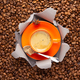 Cup of coffee and beans in torn paper. Coffee bean and espresso - PhotoDune Item for Sale