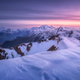 Snow covered mountains and purple sky with clouds at sunset - PhotoDune Item for Sale