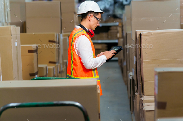 Employee of a logistics warehouse conducts an inventory of products