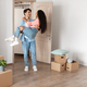 Happy millennial couple celebrating moving day in new flat - PhotoDune Item for Sale