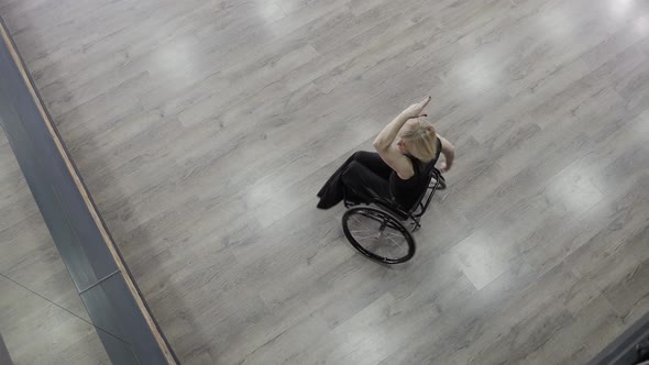 Ball Dancer with Disability Whirling on Wheelchair alt