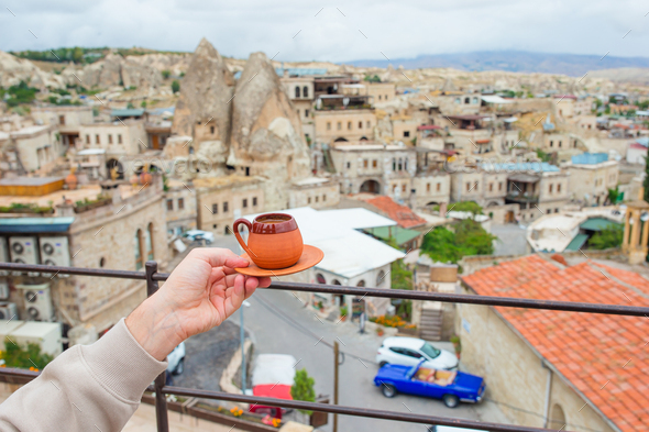 Cup with traditional Turkish coffee on a background of a valley in Cappadocia, Turkey