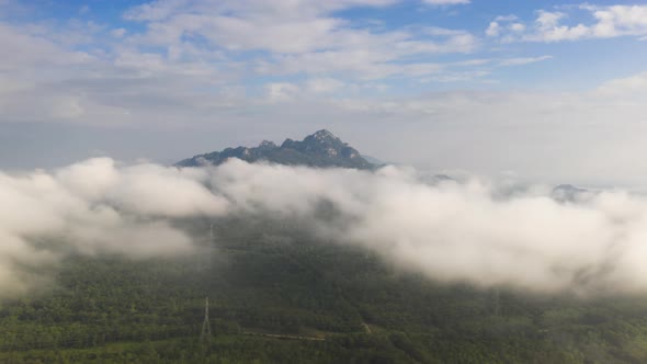 Beautiful Landscape in the morning time during sunrise with fog above the mountain, alt