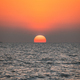 Sundown Above Sea Horizon At Sunset. Natural Sunrise Sky Warm Colors Over Ocean - PhotoDune Item for Sale