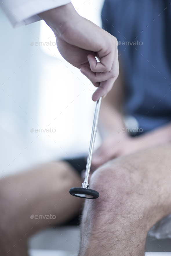 Doctor and patient with reflex hammer