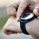 Close-up of man checking smartwatch - PhotoDune Item for Sale