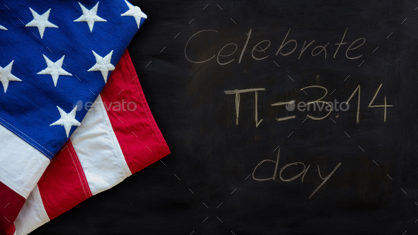 Pi number day, Celebrate Pi text chalk drawing and US flag on a school black board.