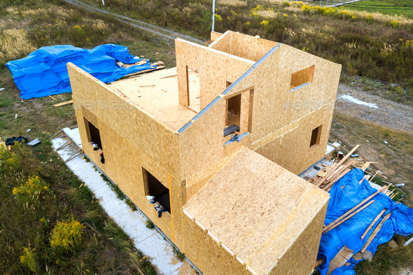 Construction of new and modern modular house. Walls made from composite wooden sip panels with