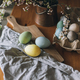 Easter eggs on rustic table with cherry blossoms. Happy Easter!  Countryside still life - PhotoDune Item for Sale