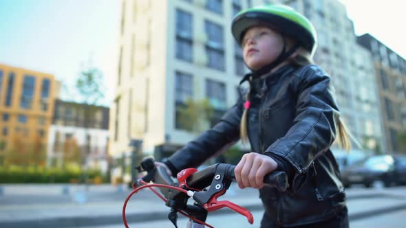 Cute Female Kid in Safety Helmet Ready to Ride Bicycle Outdoor, Favorite Hobby