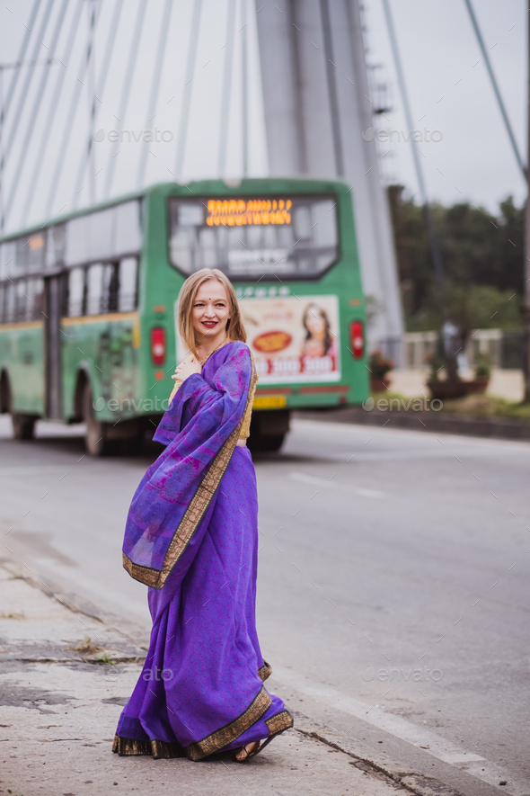 Young european woman with short hair in purple traditional saree. Outdoor  portrait. India, Bangalore Stock Photo | Adobe Stock