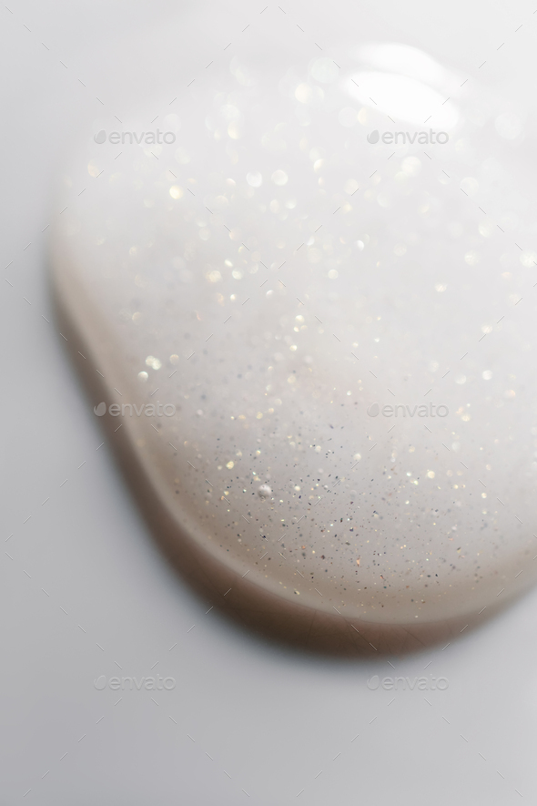 A drop of cosmetic product on a white background.